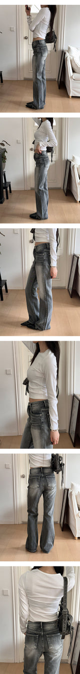 Grayish boots cut denim pants 