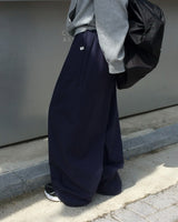 One-pin tuck strap balloon cotton pants