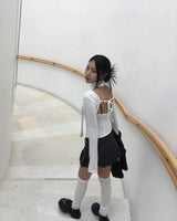 Low check button skirt