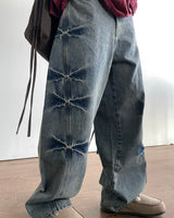 ピンカーブデニムパンツ