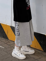 one-pocket lettering bermuda pants
