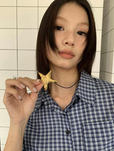 Vintage gold spiral star necklace