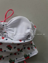 a strawberry tube top bikini