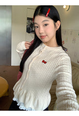 Twisted frill knit long-sleeved cardigan
