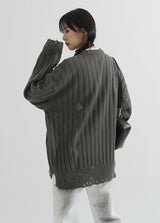 Bold ribbed damage over knit