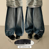 Leg hem snap side pin tuck denim wide pants