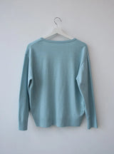 deep U-neck knit top