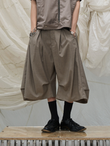 RELABEL Element of Time (cont'd) Horizontal and vertical pleats, elegantly draped silhouette, 8-minute trousers