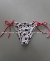 a strawberry tube top bikini