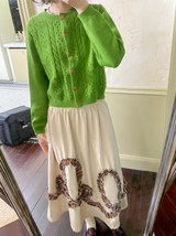 Round neck knitted cardigan sweater with regular shoulder and woolen fabric