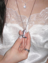 Click heart boot necklace