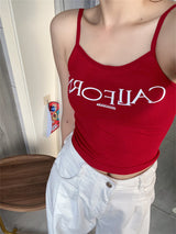 イエローレタリングパッドスリーブレスTシャツ