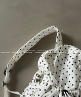 Dot dot string pocket backpack