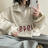 Onring Boxy Half Zip-Up sweatshirt