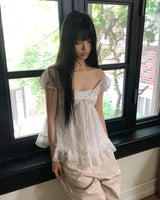 ラネルフローラルスリーブレスブラウス