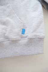 a spring hoodie jacket, melange white