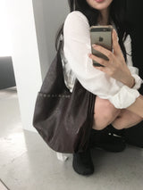 eyelet shoulder bag