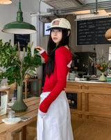 フルーツバックツイストリブニットロングスリーブ