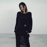 Loose drop label knit