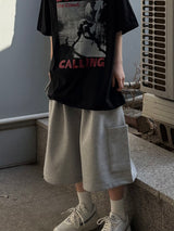 one-pocket lettering bermuda pants