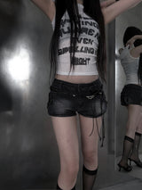 cross studded black denim shorts