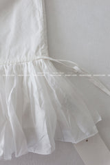 Salon frill string mini-dress