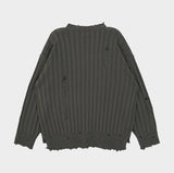 Bold ribbed damage over knit