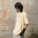 RELABEL 24SS ‘Auxiliary Graphic’ スプリットロゴプリントアプリコットTシャツ