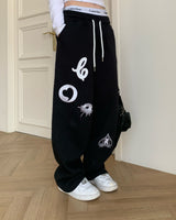 アリスインワンダーランドスウェットパンツ (Unisex)