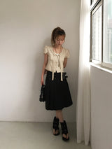 Buckle pleats midi skirt
