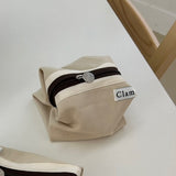Clam ラウンドポーチ _ アングバター