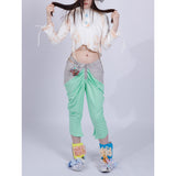 light green pleated pants