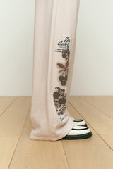 LUNA WASHING VINTAGE GRAPHIC JERSEY PANTS [IVORY]