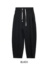 ヘンネプリーツバルーントレーニングパンツ
