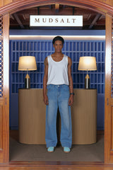 WASHING CURVED WIDE DENIM PANTS LIGHT BLUE