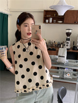 dotted sleeveless blouse