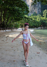 a strawberry tube top bikini