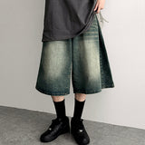 A.D washing side pintuck over wide denim shorts