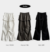 Log banding layered pocket skirt pants
