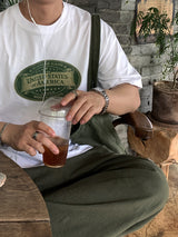 ルックセンテッドアメリカンヴィンテージグラフィックオーバーサイズドショートスリーブTシャツ