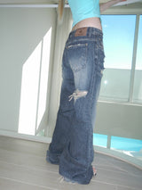 walk destroyed jeans