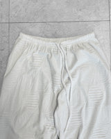 BUBBLE FRILL CAPRI PANTS
