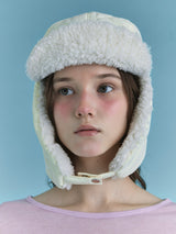 PADDING EARFLAP HAT IN CLOVER BUTTER