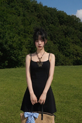 BACK OPEN FLARE MINI DRESS IN BLACK