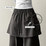 Log banding layered pocket skirt pants