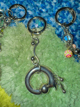 Curved pierce keychain
