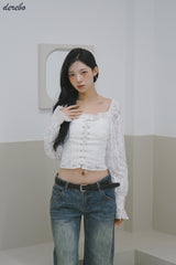 daisy punching strap frill blouse