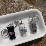 fishing cat key chain white