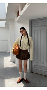 a forsythia striped loose-fit shirt
