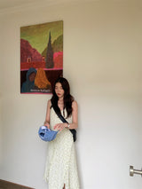 Slit shirring flower long sleeveless dress